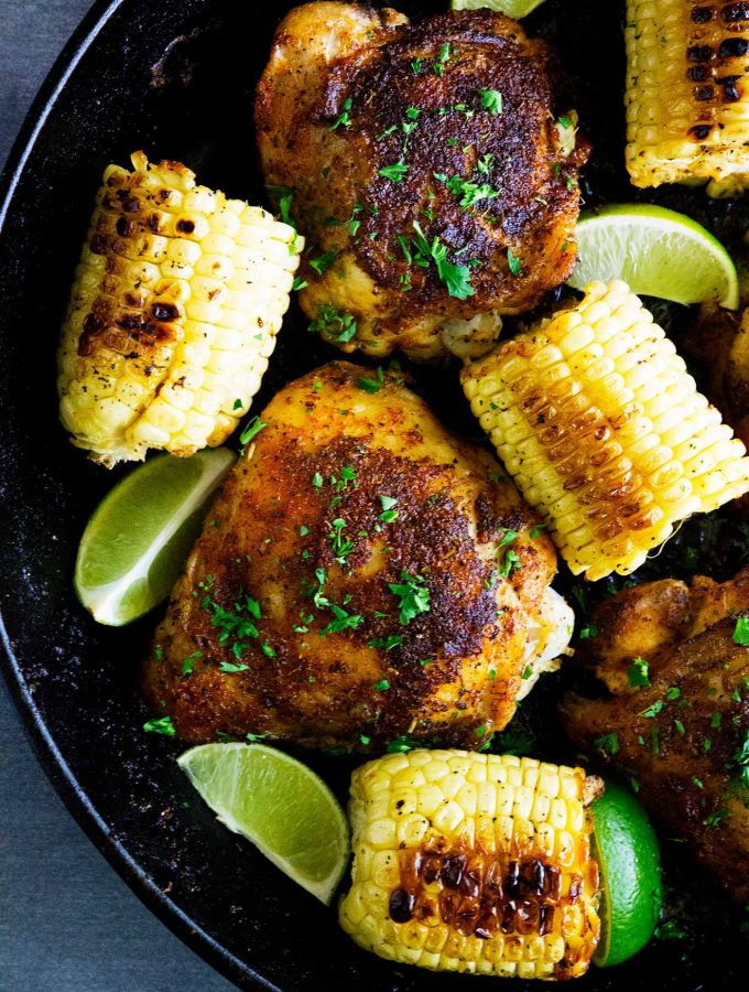 The flavors of the Bayou come alive in these Bayou Cajun Chicken Thighs. Loaded with flavor this easy meal is topped with corn and lime juice and is absolutely tasty!