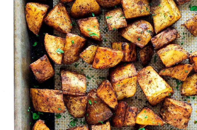 These roasted russet potatoes are tossed in olive oil with herbs and seasonings then roasted to perfection in your oven.
