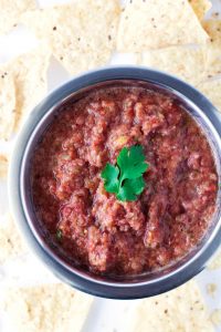 This restaurant style salsa is made with fresh ingredients, is bright and fresh, easy to customize the spiciness, and takes about 5 minutes to make. 