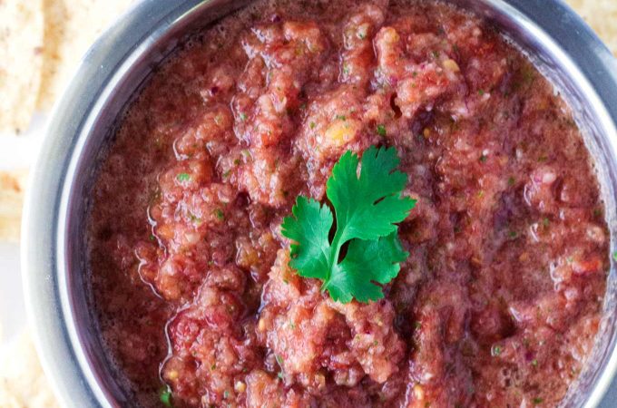 This restaurant style salsa is made with fresh ingredients, is bright and fresh, easy to customize the spiciness, and takes about 5 minutes to make. 